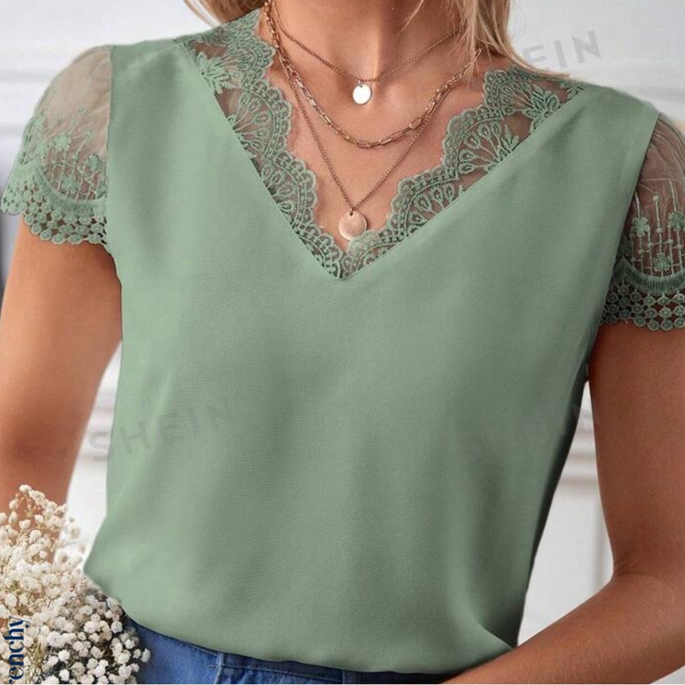 Size small runs a little big with embroidery green top.
